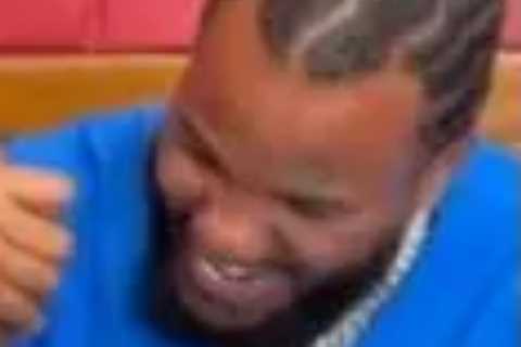 Watch Mike Tyson ‘lose’ arm wrestle with The Game while smoking a joint after giving rapper shrooms