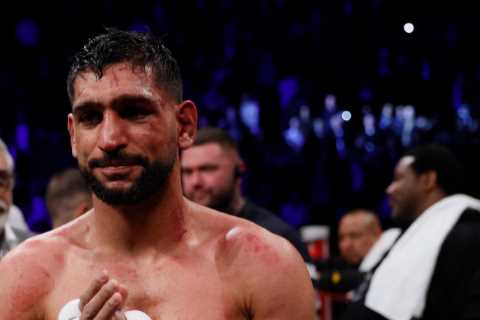 Three men charged after boxing world champion Amir Khan mugged at gunpoint for £72k watch
