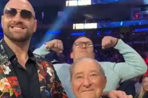 Watch moment Tyson Fury photobombed by undisputed heavyweight title rival Oleksandr Usyk before the pair embrace