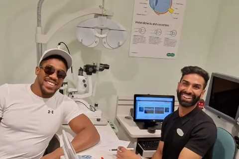 Anthony Joshua stuns Specsavers staff as he drops in for eye test without warning ahead of Oleksandr Usyk rematch