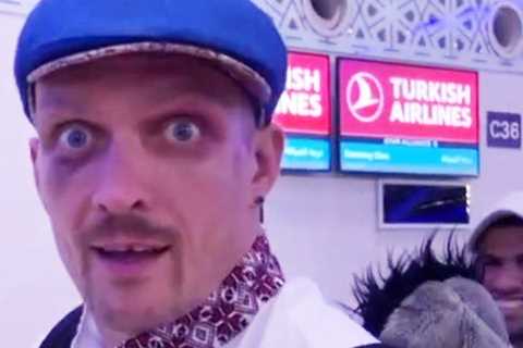 Oleksandr Usyk shows off two black eyes at airport after Anthony Joshua fight and carries emotional stuffed donkey toy