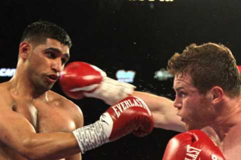 Getting punched by Canelo’s punches is like ‘being hit with a baseball bat’ because of special gloves, Amir Khan reveals