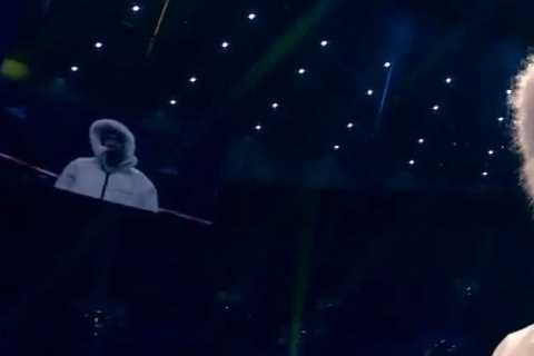 Itauma wraps up in hooded jacket during ring walk on Tyson Fury vs Derek Chisora undercard to combat freezing weather