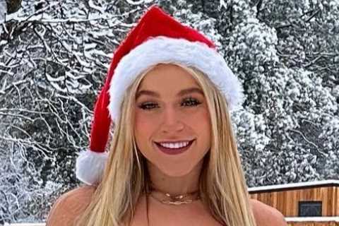 OnlyFans star Elle Brooke braves the cold to stun in racy red lingerie while showing peachy bum