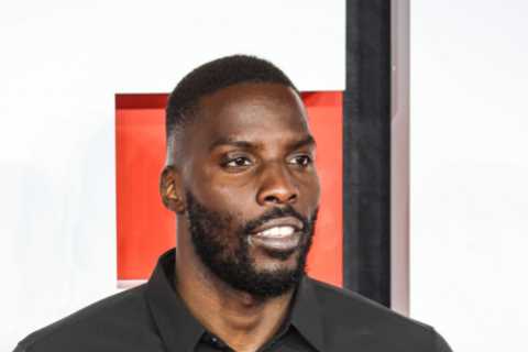 Lawrence Okolie scraps with Richard Riakporhe at Creed III premiere with boxers held back by pals in incredible scenes