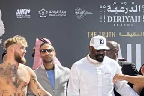 Tommy Fury pushes Jake Paul and vows to end his career as rivals face off at weigh-in ahead of bitter grudge fight