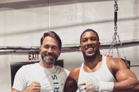 Hulking Anthony Joshua poses with Eddie Hearn as promoter stops off in Texas to watch heavyweight in training for return