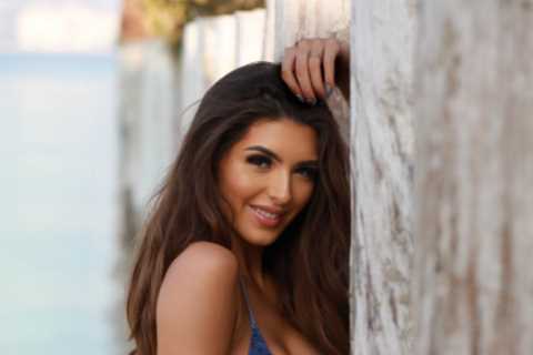 Anthony Joshua Ring girl Chloe Ellman-Baker is a knockout in plunging denim-look swimsuit