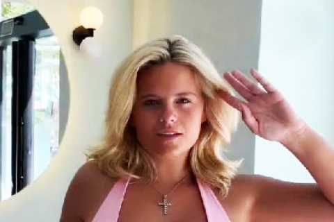 Watch busty ring girl Apollonia Llewellyn nearly suffer huge blunder as she wows fans in very revealing pink top