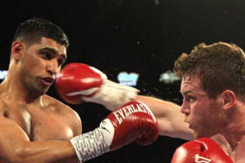 A punch from Canelo Alvarez is like ‘being hit with a baseball bat’ because of special gloves, Amir Khan claims