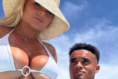 Busty ring girl Apollonia Llewellyn risks wardrobe malfunction as she shows off major underboob barely-there bikini