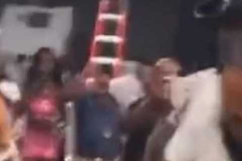 Reality TV star and topless rapper fight in shocking backstage brawl at Mayweather vs Gotti III