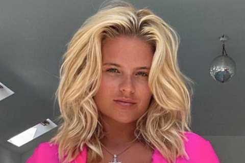 Busty boxing ring girl Apollonia Llewellyn spills out of pink top as fans call her ‘most beautiful girl in the world’