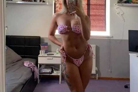 Stunning MMA fighter turned-OnlyFans star sizzles in bikini and gives fans sneak peak inside her bedroom