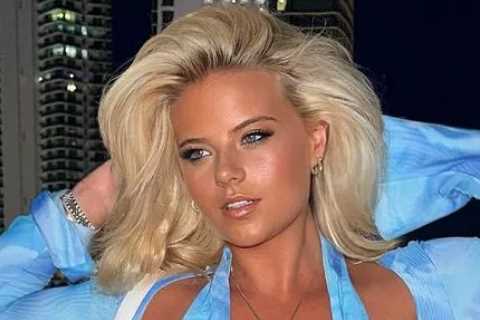 Busty ring girl Apollonia Llewellyn bursts out of blue dress and exposes underboob in bikini with fans ‘beyond obsessed’