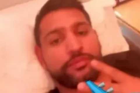 Amir Khan shares selfie while flying back to London after sexting scandal saw him ‘split’ with wife
