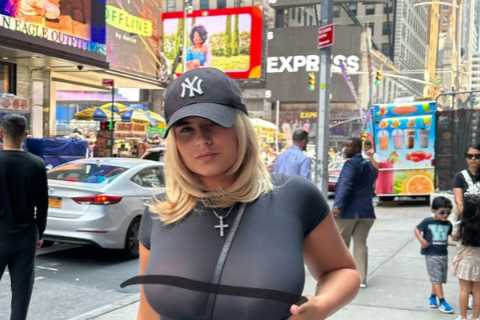 Boxing ring girl Apollonia Llewellyn's wardrobe malfunction forces her to cover up before flaunting her figure in a red top