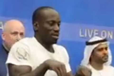 Boxer Pretends to be Dinosaur in Baffling Weigh-in Stunt