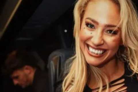 ‘Sexiest boxer ever’ Ebanie Bridges flaunts cleavage in daring outfit as she playfully asks ‘does this make you thirsty?’